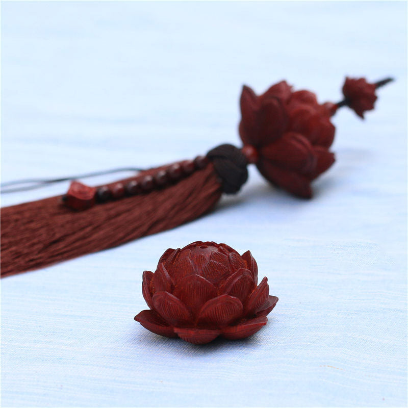 Red Sandalwood Lotus Tassel - foreground lotus close-up with tassel in soft background