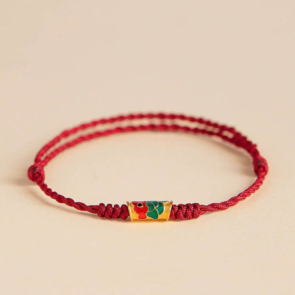 Koi Fish Wealth Bracelet – Koi fish red rope bracelet on display stand, Chinese jewelry