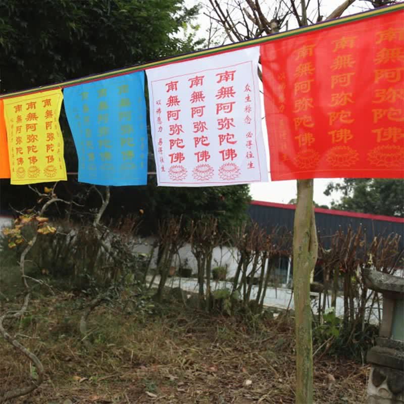 Tibetan Windhorse Lotus Prayer Flag Set - yellow blue white red flags hung in garden