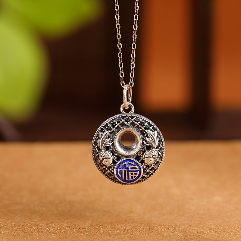 999 Silver Koi Lotus Necklace – close-up of carved lotus flower on pendant, silver jewelry