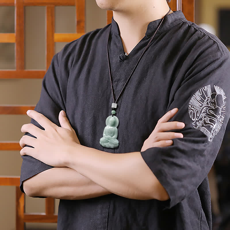 Amitabha Buddha Jade String Necklace - Lifestyle shot with dragon embroidery and wooden lattice