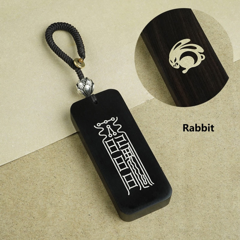 Ebony Big Dipper zodiac keychain with silver inlay Monkey symbol and celestial script