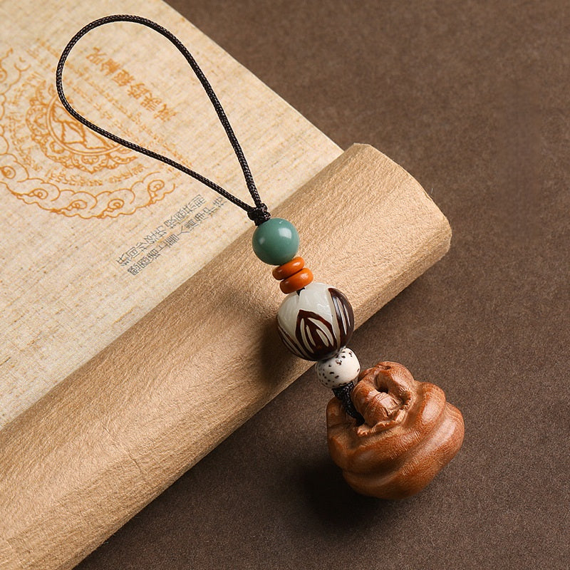 Peach wood Feng Shui phone charm with fine cord, carved persimmon and star-moon bodhi bead