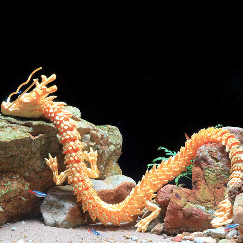 Feng Shui 3D Dragon - Gold metallic dragon coiled on mossy rock in dark aquarium, powerful luck