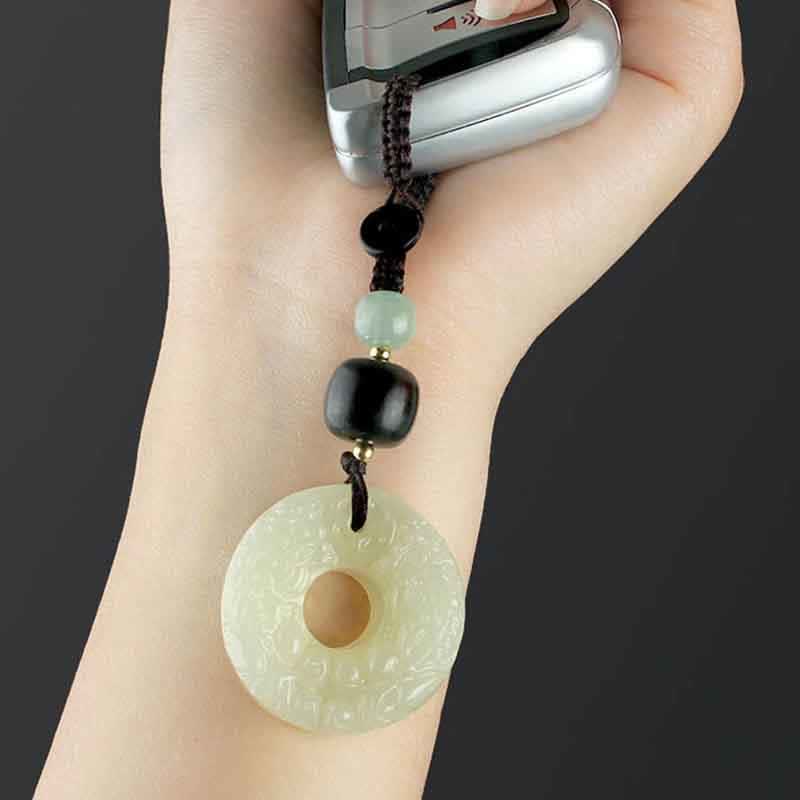 Jade PiXiu Peace Buckle Abundance Key Chain – Jade keychain hanging from car key fob in hand, spiritual keyring