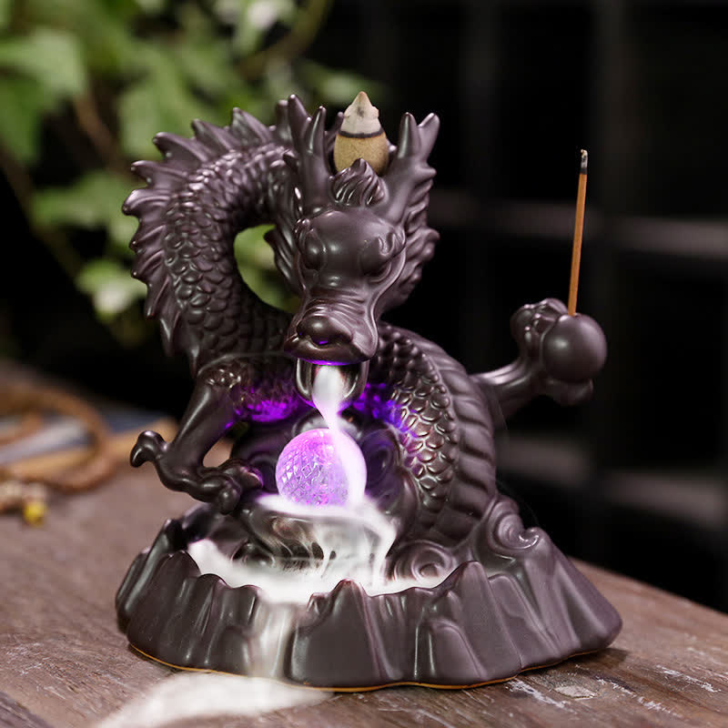 Dragon Backflow Incense Burner – Coiled dragon with purple LED orb and cascading smoke, meditative