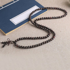 Sterling Silver Sandalwood Mantra Bracelet – 108 sandalwood beads with silver inlay and blue book prop, zen beads