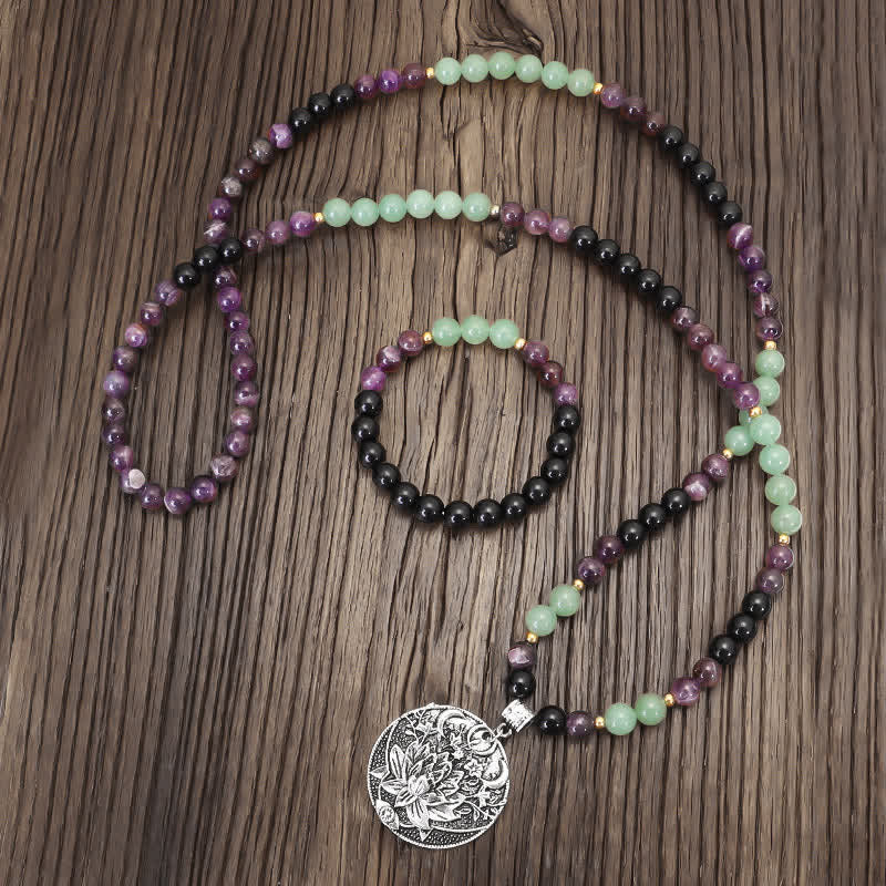 Amethyst Aventurine Lotus Mala - Long beaded necklace with silver lotus medallion, loose loops on wood