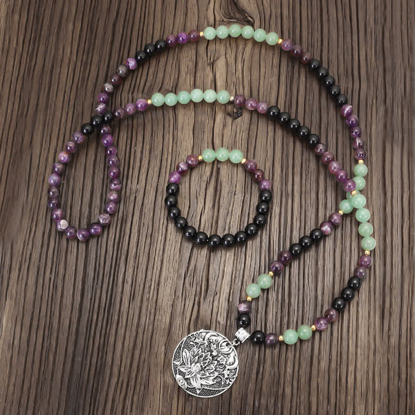 Amethyst Aventurine Lotus Mala - Long beaded necklace with silver lotus medallion, loose loops on wood