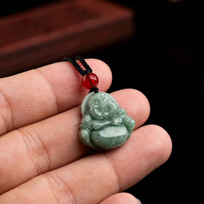 Green Jade Laughing Buddha Necklace - carved sage jade pendant held in hand showing size, braided cord, Joyful