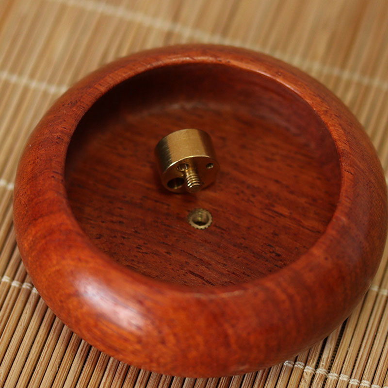 Rosewood Incense Burner – top-down view of brass threaded insert with multiple holes inside polished bowl, crafted