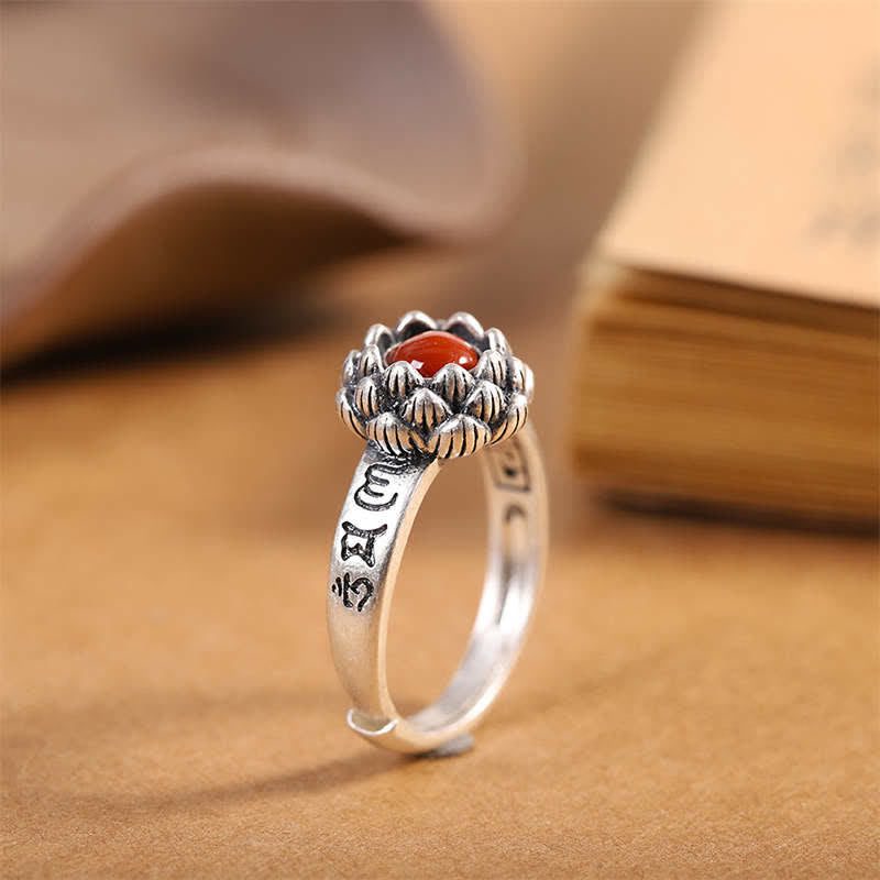 925 Silver Lotus Red Agate Ring – oxidized silver lotus setting with carnelian cabochon on aged calligraphy book, vintage spiritual ring