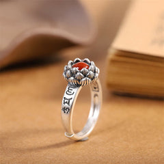 925 Silver Lotus Red Agate Ring – oxidized silver lotus setting with carnelian cabochon on aged calligraphy book, vintage spiritual ring