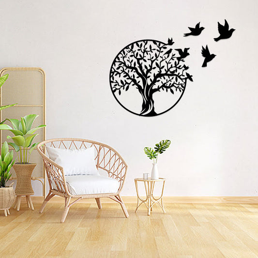 Tree of Life Birds Metal Wall Art - black tree with flying birds on white wall in boho living room with plants
