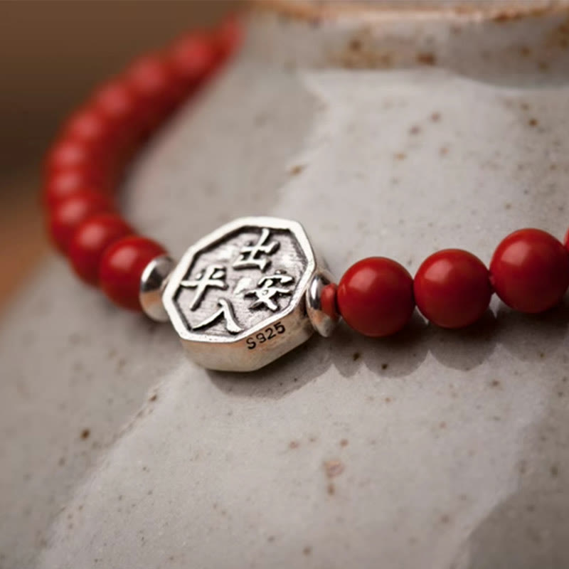 925 Sterling Silver Yin Yang Bagua Cinnabar Bracelet – S925 silver charm close-up on red beads, sterling silver detail
