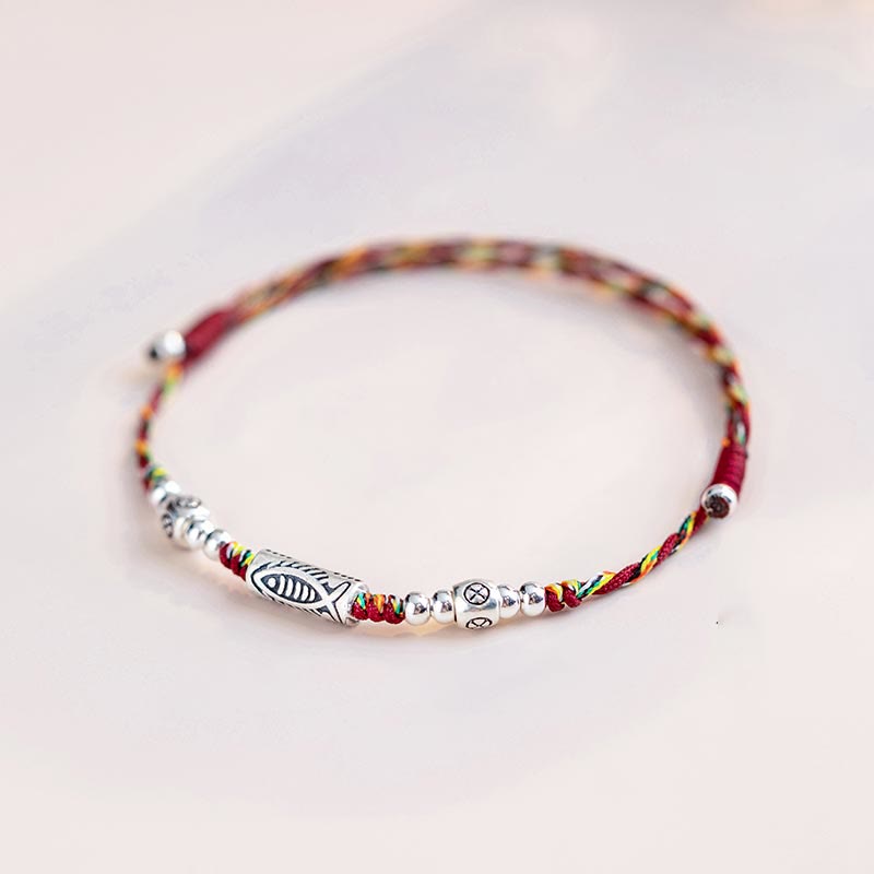 925 Koi Braided Bracelet - flat lay showing full colorful braided cord with 925 silver koi