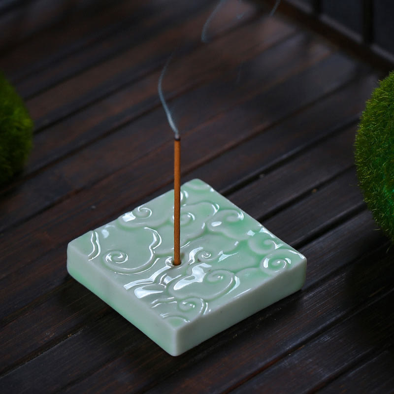 Mini Auspicious Clouds Ceramic Incense Burner – green square holder with lit stick and smoke on dark wood with moss, zen incense burner