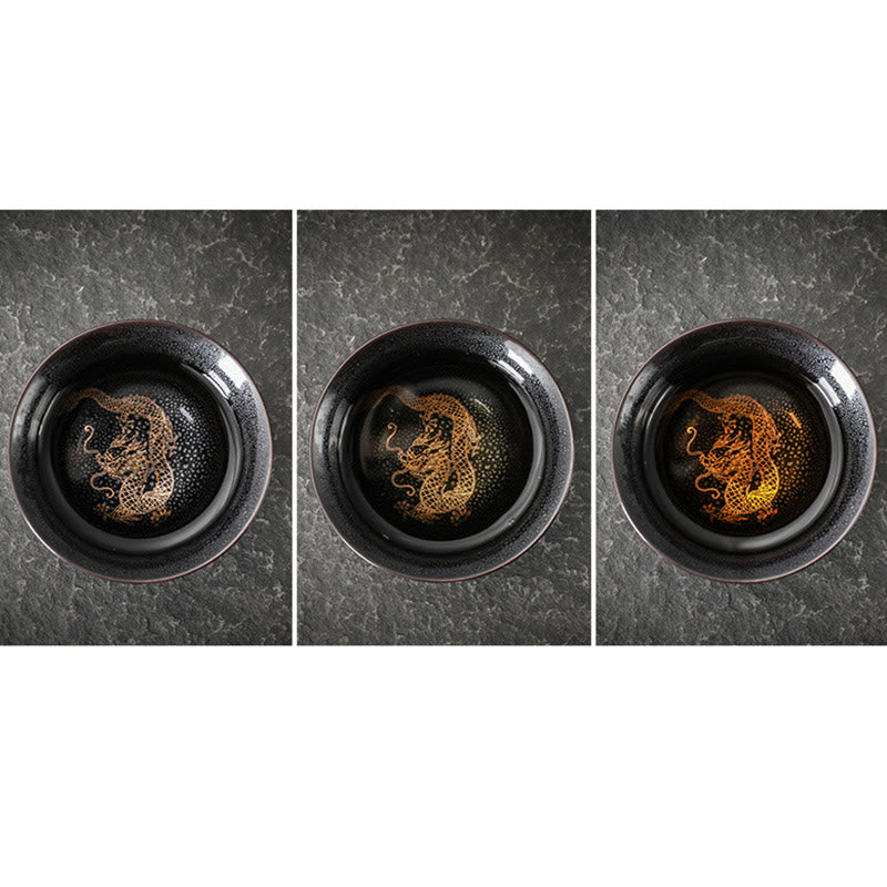 Gold Leaf Jianzhan Teacup – Interior view of gold leaf koi fish pattern in tenmoku glaze, tea bowl
