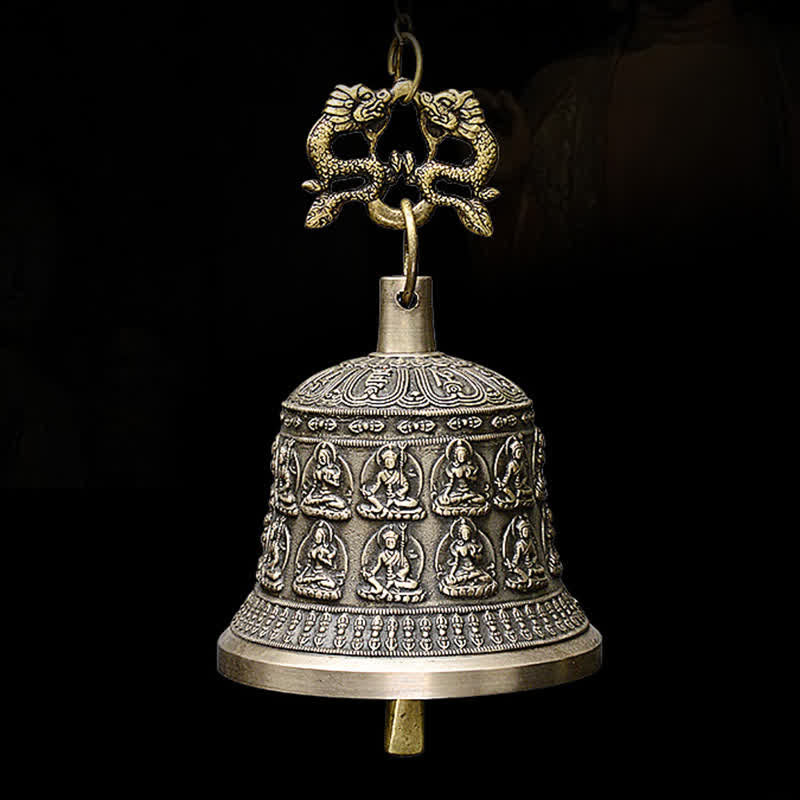 Tibetan Buddha Dragon Bell straight-on frontal view, double-dragon hanger, eight Buddha figures, dramatic lighting