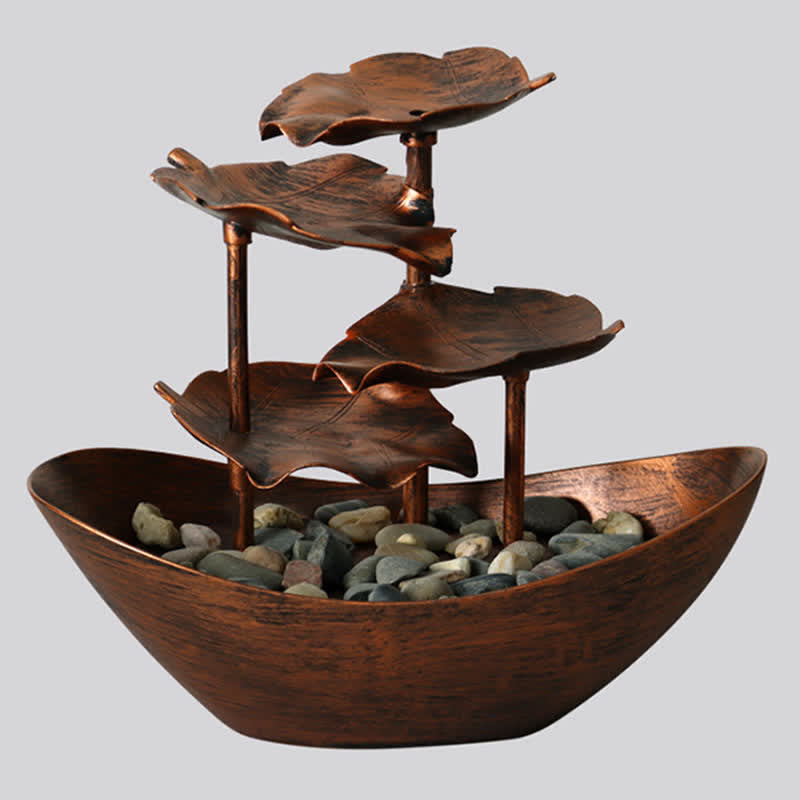 Lotus Leaf LED Waterfall Fountain - warm copper leaf cascade on white, tabletop lotus fountain