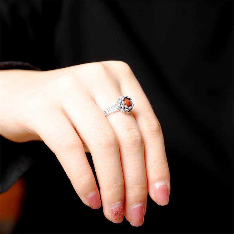 925 Silver Lotus Red Agate Ring – silver cocktail ring with red agate cabochon in floral bezel, model hand close-up, statement jewelry
