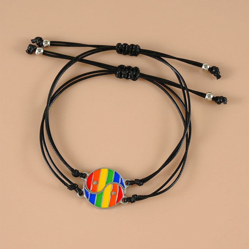 Yin Yang Hematite Bracelet - Rainbow striped yin-yang pendants on black waxed cords, couple set