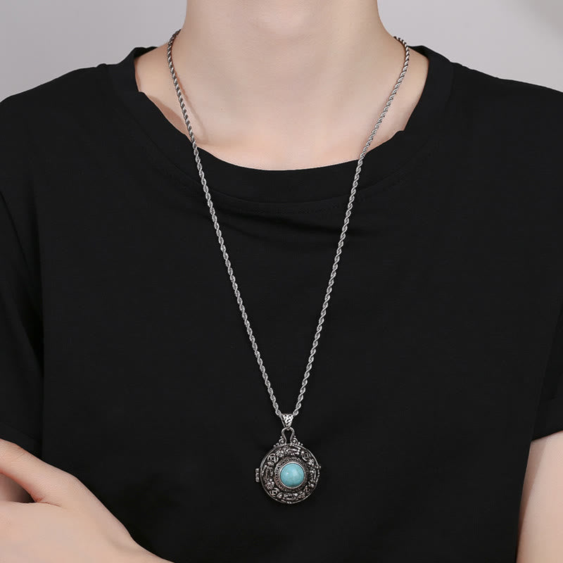 Tibetan Pi Xiu Necklace – Model wearing silver locket necklace with black shirt