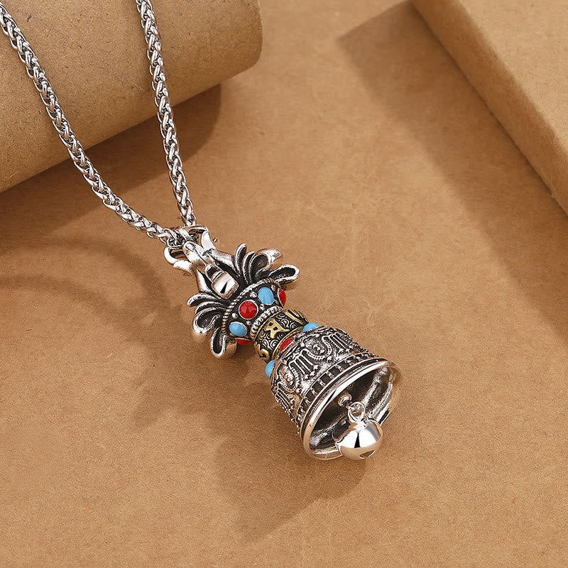 Tibetan Vajra Bell Pendant – Angled view with rope chain, showing engraved details and stone inlays, ethnic jewelry