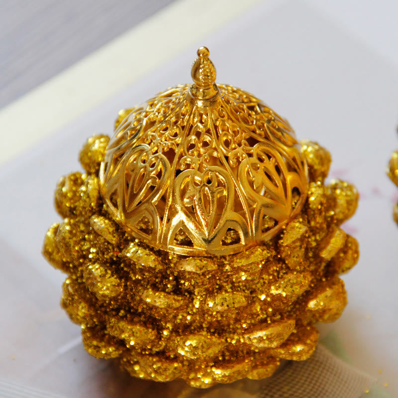 Gold Pine Cone Mini Incense Burner - Close-up dome lid with leaf cutouts on lotus base, gold decor