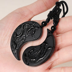 Black Obsidian Dragon Phoenix Necklace - Dragon phoenix yin yang pendant held in open palm, Balance