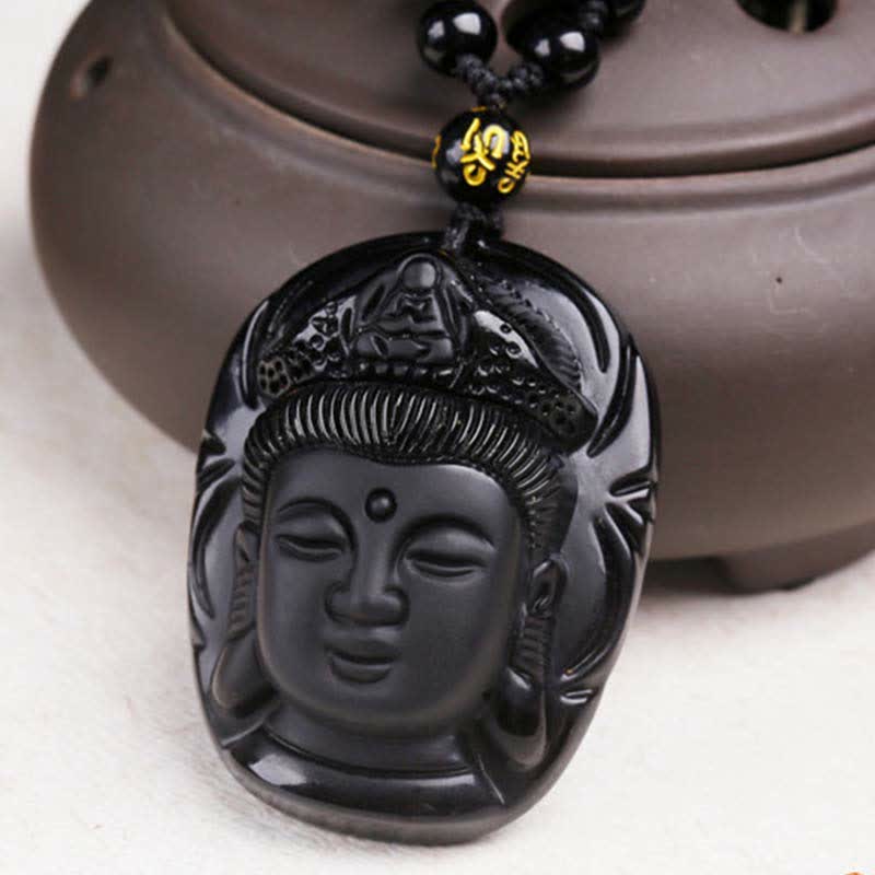 Black Obsidian Avalokitesvara Pendant - carved bodhisattva with ornate headdress on cord, teapot setting, Courage
