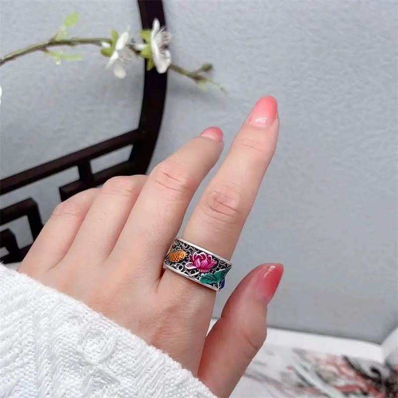Copper Enamel Koi Fish Ring – flat lay with tea candle and dried flower props zen aesthetic