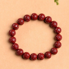 Cinnabar Om Mani Padme Hum Bracelet – mantra carved burgundy beads with pine accent, red mala bracelet