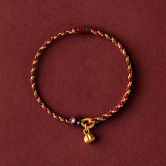 Red Gold Rope Lotus Braid Bracelet - circular flat lay with lotus pod charm, lucky cord bracelet