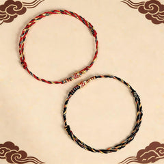 Five-Color Koi Bracelet – red and black pair of braided koi bracelets on cream background with cloud motifs, matching set