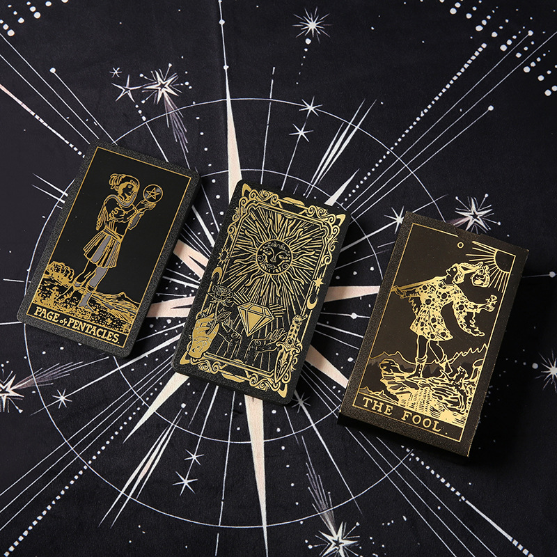 Waterproof Tarot Deck – Black box with gold foil Fool illustration and celestial motifs, PET cards