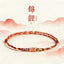 Five-Color Koi Bracelet – multicolor braided band with gold koi charm on watercolor background, success luck jewelry