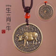 Zodiac Bagua Pendant – brass ox coin with Chinese seal, textured antique bronze finish, protection