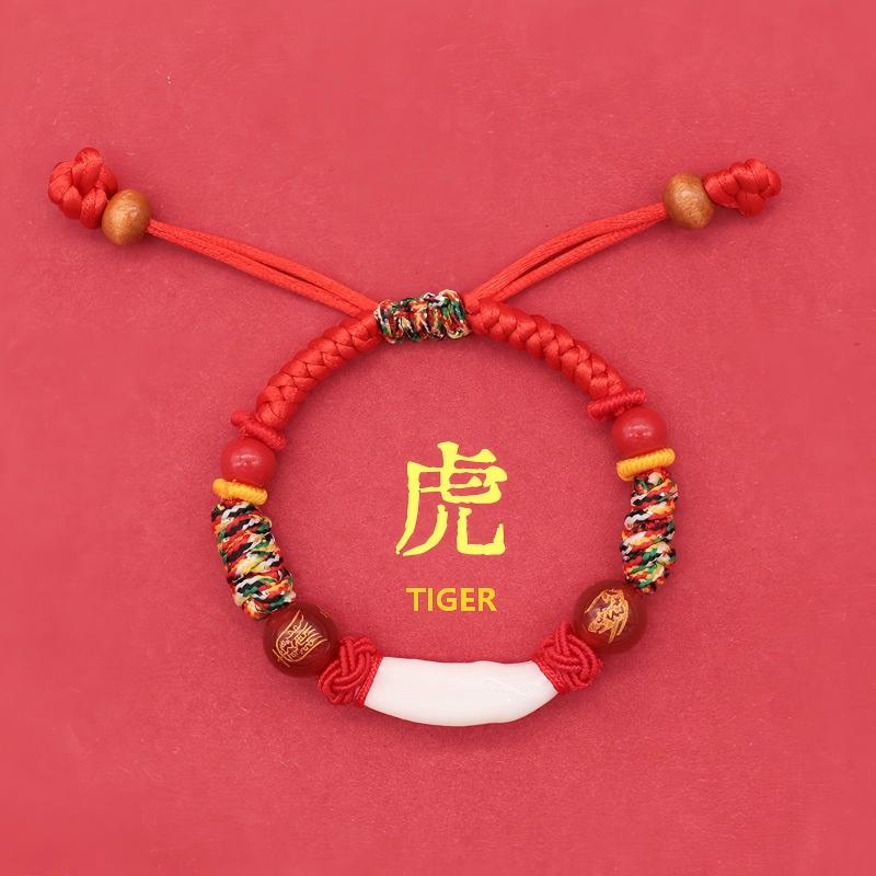 Kids Zodiac Bracelet – tiger zodiac design, vivid red cord, yellow ring accents, toddler amulet