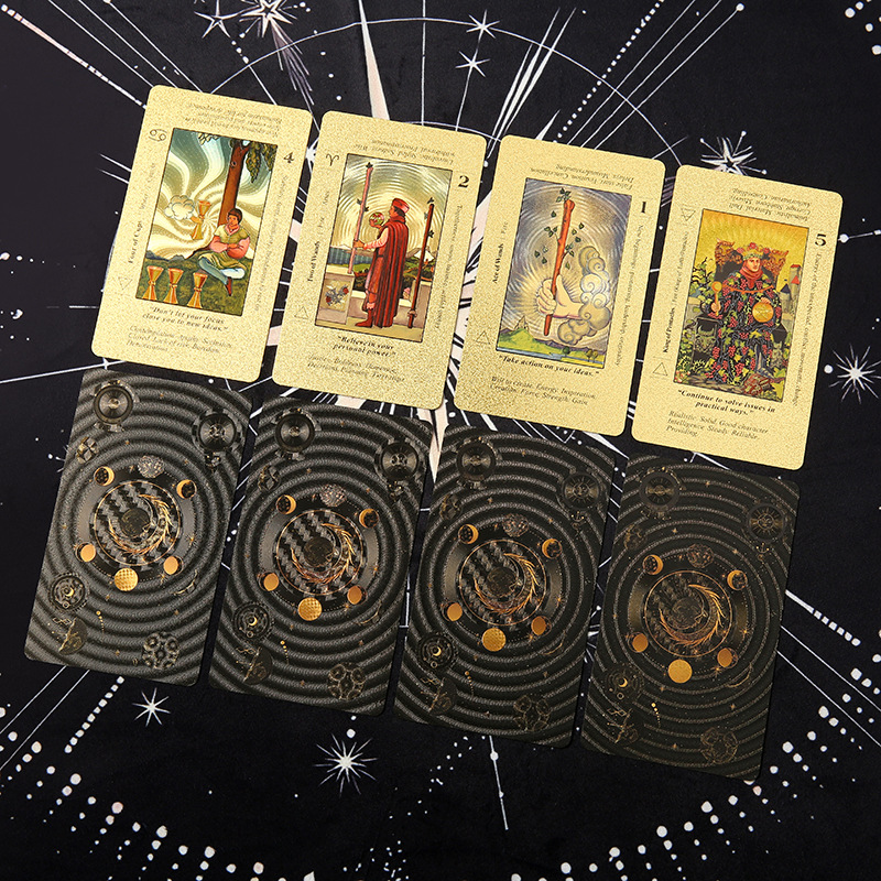 Waterproof Tarot Deck – Tarot card spread on black cloth with white star map pattern, gold foil cards