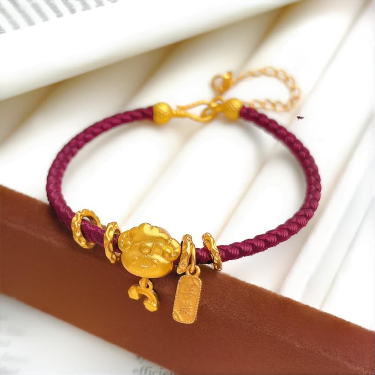 Ben Ming Nian Bracelet – gold sheep charm, fluffy design, burgundy band with gold clasp, joy symbol