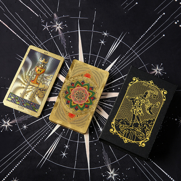 Waterproof Tarot Deck – Multiple gold foil cards displayed on black celestial backdrop, luxury deck