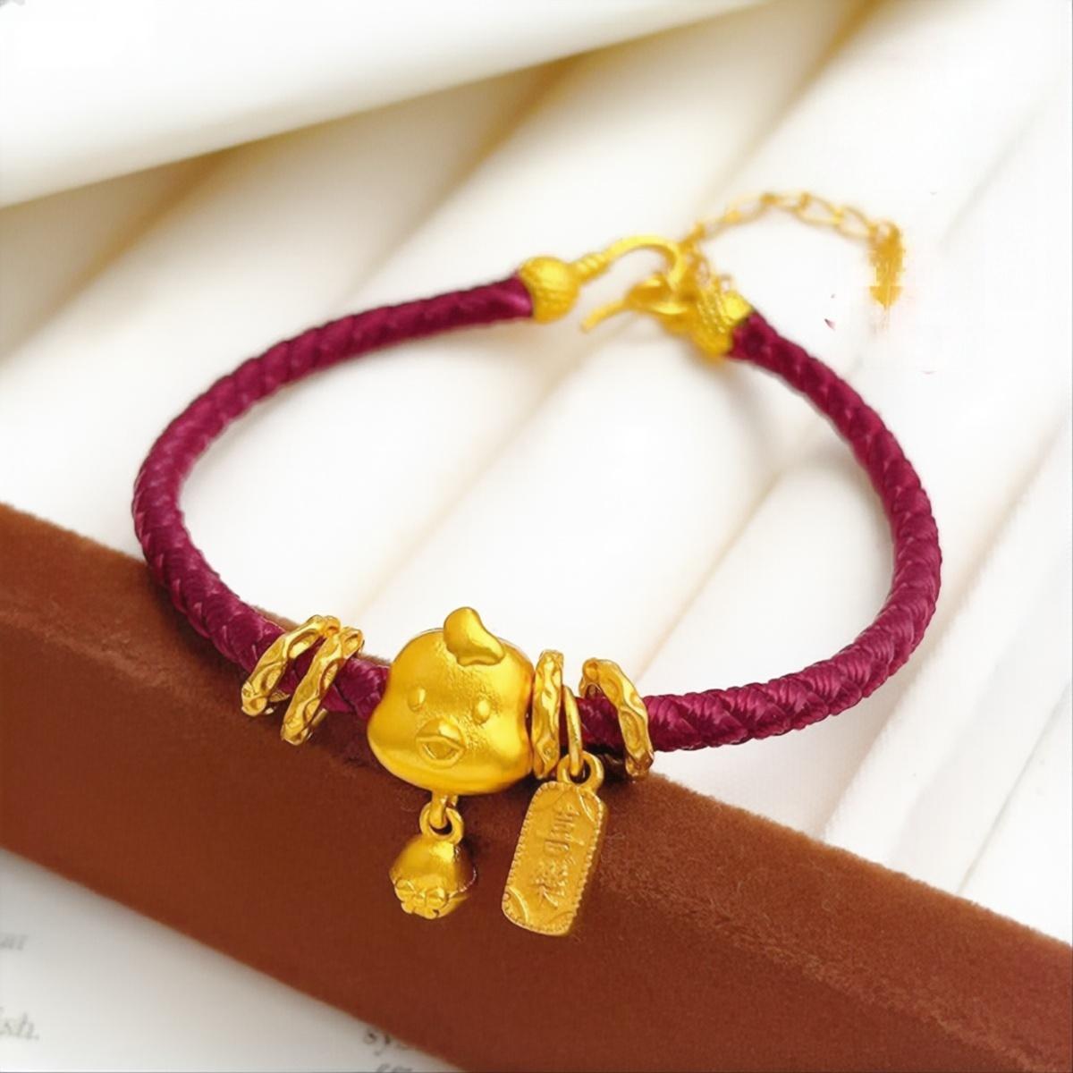 Ben Ming Nian Bracelet – gold rooster charm on crimson cord, detailed feather texture, peace tag