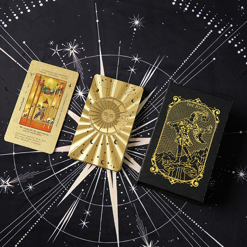 Waterproof Tarot Deck – Four of Wands face card with gold sunburst card back and black box, foil set