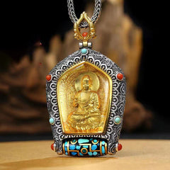 Tibetan Zodiac Buddha Dzi Bead Necklace – Gold Manjushri Bodhisattva pendant in ornate silver frame with turquoise coral stones and prayer wheel base on wood branch