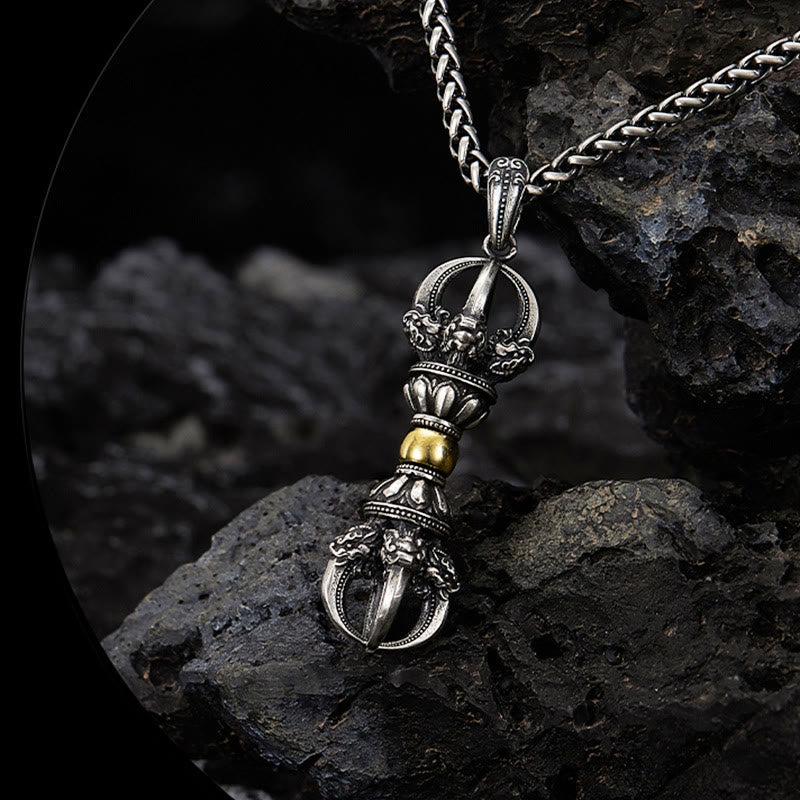 Tibetan Vajra Dorje Pendant Necklace – Silver-toned metal with gold center band and lotus engravings, dark stone surface
