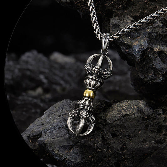 Tibetan Vajra Dorje Pendant Necklace – Silver-toned metal with gold center band and lotus engravings, dark stone surface