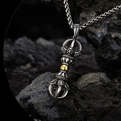 Tibetan Vajra Dorje Pendant Necklace – Silver-toned metal with gold center band and lotus engravings, dark stone surface