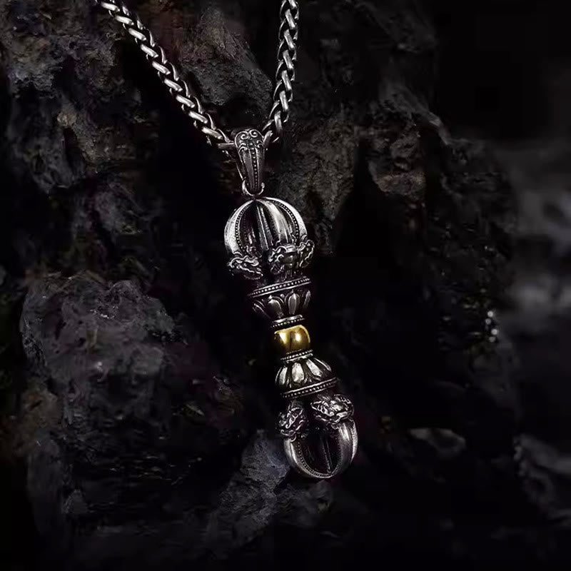 Tibetan Vajra Dorje Pendant Necklace – Oxidized silver with gold accents, dragon head details on wheat chain, volcanic background