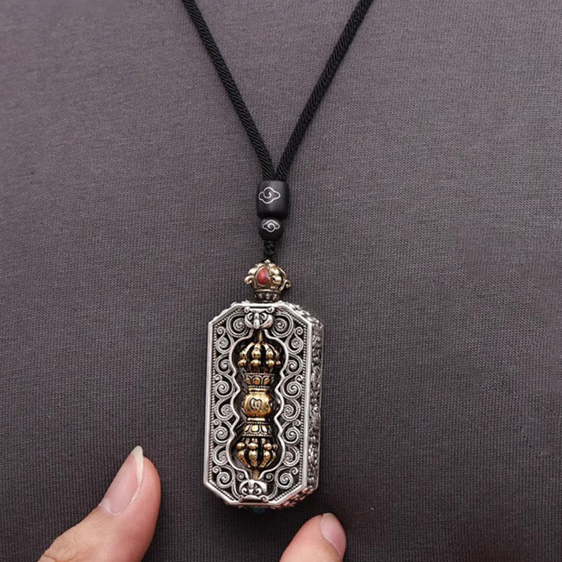 Dorje Vajra Rope Pendant – Front view with cloud-motif bead, gold vajra in silver frame, mantra necklace